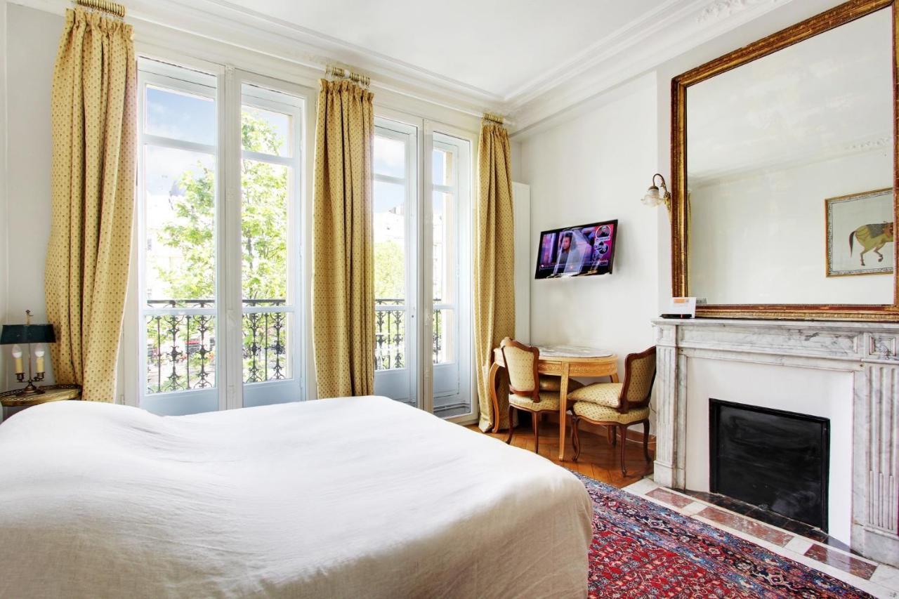 Suite Junior Avec Balcon Et Vue Sur Arc De Triomphe Paris Eksteriør billede